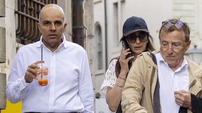 Ajay Hinduja (L) and his wife Namrata arrive with their lawyer at the court house, in Geneva, on, June 10. EPA
