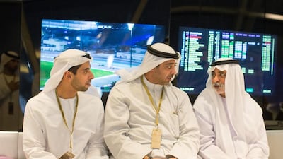 Sheikh Khaled bin Zayed, Deputy Chairman of Etihad Airways, Sheikh Mohammed Abdulla Al Mubarak Al Sabah, Minister of Cabinet Affairs of Kuwait, and Sheikh Nahyan bin Mubarak, Minister of Culture, Youth and Community Development, attend the final race of the 2014 Formula 1 Etihad Airways Abu Dhabi Grand Prix at Yas Marina Circuit. Mohamed Al Hammadi / Crown Prince Court — Abu Dhabi