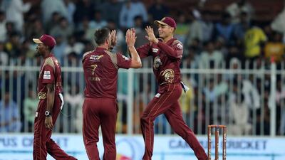 Warriors' Hardus Viljoen takes the wicket of Pakhtoons' Colin Ingram. Chris Whiteoak / The National