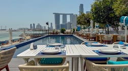 A table with a view on Reem Island. Photo: Ibn AlBahr