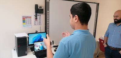 WonderTree co-founder and chief executive Muhammad Waqas watches a demonstration of the start-up's online gaming products. Photo: WonderTree