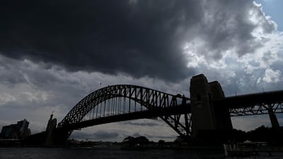 Storm clouds hang above the Sydney Harbour Bridge in Sydney, Australia. EPA