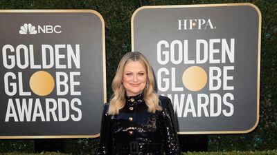 Amy Poehler, in Moschino, attends the 78th annual Golden Globe Awards in Beverly Hills, California, on February 28, 2021. EPA