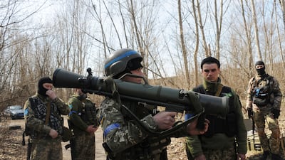 Ukrainian servicemen with a Carl Gustaf M4, a Swedish shoulder-launched weapon, during a training session on the outskirts of Kharkiv on Thursday. AP Photo