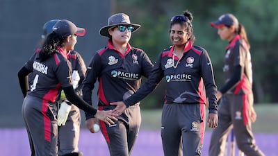 UAE captain Chaya Mughal, centre, celebrates the win over Bhutan. Pawan Singh / The National