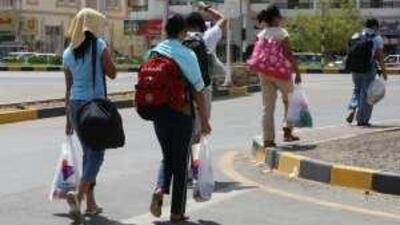 Many Filipinos travel to the Omani border town of Buraimi to get new tourist visas for the UAE.