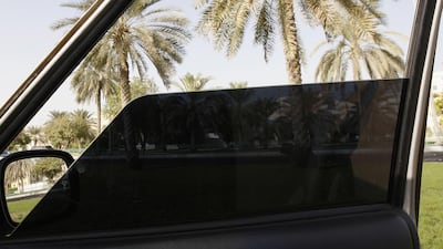 A car window with 70 per cent tint. (Philip Cheung / The National)