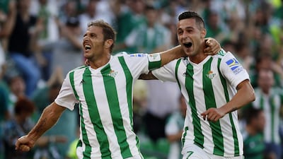 Joaquin Sanchez, left, and Sergio Leon, right are two reasons why the feel-good factor is coming back to Real Betis. Jose Manuel Vidal / EPA