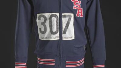 Warm-up tracksuit jacket and pants worn by 200m gold medallist Tommie Smith, who gave the Black Power salute with bronze medallist John Carlos on the podium at the 1968 Olympic Games in Mexico City. Courtesy Collection of the Smithsonian National Museum of African American History and Culture