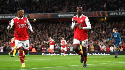 Eddie Nketiah (R) celebrates with teammate Marquinhos. EPA