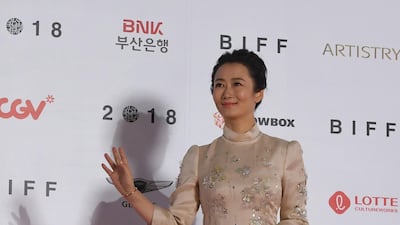 Chinese actress Zhao Tao poses on the red carpet during the opening ceremony of the 23rd Busan International Film Festival (BIFF) at Busan Cinema Center in Busan on October 4, 2018. Tao stars in Jia Zhangke's feature 'Ash is Purest White'. AFP