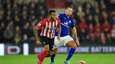 Southampton defender Ryan Bertrand holds off Leicester's Danny Drinkwater during his side's Premier League victory on Saturday. Michael Regan / Getty Images / November 8, 2014