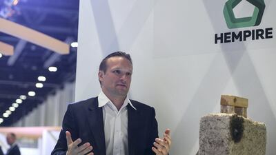 Sergiy Kovalenkov, of Hempire, explains his natural building material at the World Energy Congress. Khushnum Bhandari for The National