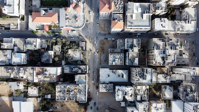 An aerial view of Wehda Street in Gaza City. On a fateful night in May last year, three Palestinian families living on the street were hit by an Israeli air strike. Flashbacks haunt surviving family members to this day. AFP