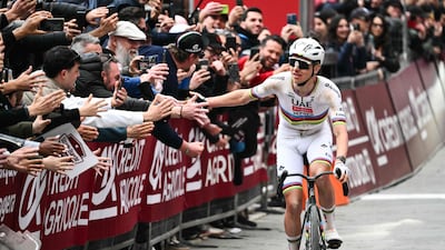 UAE Team Emirates's Tadej Pogacar acknowledges the crowd. AFP