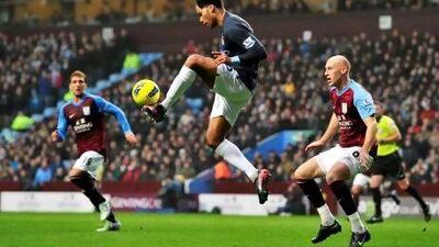 Joleon Lescott, centre, clears the ball against Aston Villa.