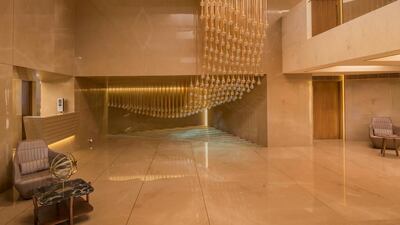 The lobby is characterised by a dramatic light fixture with 275 hand-blown bulbs 