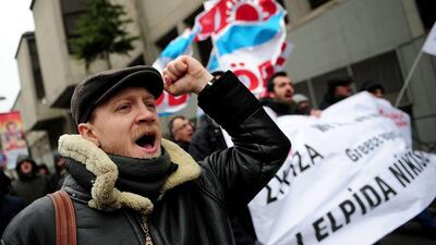 Protesers shout slogans in favour of Greece’s ruling Syriza party during a mass action against the G20 meeting in Istanbul. Ozan Kose / AFP