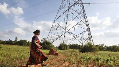 Gangarangamma, 65, walks through the land she and her husband farmed for decades which records show is registered to the government.