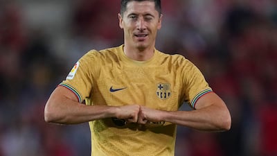 Robert Lewandowski celebrates after scoring Barcelona's first goal against Mallorca at Estadi de Son Moix on October 1, 2022 in Mallorca, Spain. Getty