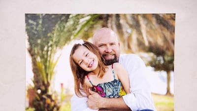 Daniel Swayne and his daughter Grace, who wants to be a pilot like her father. The 51-year-old American was killed alongside Emirati pilot Nawaf Al Nuaimi when their AT-802 training aircraft crashed this month. Courtesy Swayne family