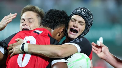 DESS College celebrate their win after their match against Dubai College at the Emirates Dubai Sevens. Victor Besa / The National