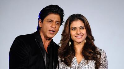 Shah Rukh Khan and Kajol head a line-up of stars who will walk the red carpet at Diff. AFP PHOTO / AFP / STR