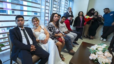 Couples at the court, which was established to introduce a civil legal framework tailored for expats