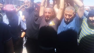 Mourners carry Mr Al Jaramani's coffin