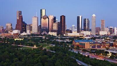 Head offices dot the Houston skyline. Jeremy Woodhouse / Getty Images