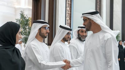 Sheikh Mohamed bin Zayed meets the top performing pupils of the year and their parents at Al Bateen Palace. Rashed Al Mansoori / Ministry of Presidential Affairs