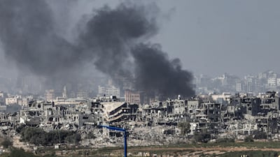 A photo taken from the Israeli side of the border with Gaza shows the continued Israeli bombardment of the northern Gaza Strip. AFP