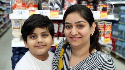 Ummay Hani, an Indian expat, 28, said her four-year-old son drinks a lot of soft drinks but she intends to reduce his consumption after the increase in cost. Chris Whiteoak / The National