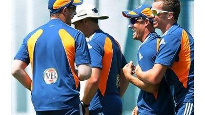 From left, Australia's Shaun Marsh, Michael Hussey and Peter Siddle will be hoping to relax and come up strong to the challenge of a drier than usual wicket at the Galle Stadium. Lakruwan Wanniarachchi / AFP