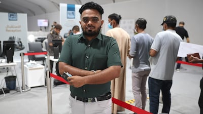 Abhijeet Ahire, an Indian software engineer, has secured employment with LuLu Exchange and can remain in the UAE after living without legal documents for more than two years. All photos: Victor Besa / The National
