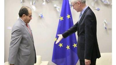 The chairman of the National Transitional Council of Libya, Mahmoud Jibril, left, is welcomed by the European Council president, Herman Van Rompuy, in Brussels yesterday. OLIVIER HOSLET / EPA