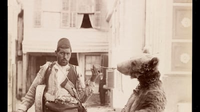 A busker and his bear in Istanbul, sometime bewteen the 1870s and 1890s. Part of the Gigord Collection at the Getty Research Institute. Courtesy Getty Research Institute