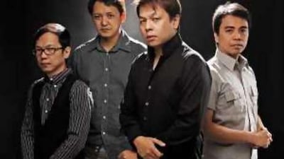 Jett Pangan, front right, with his band, The Dawn.
