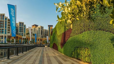 Living green walls such as this can help offset air pollution and reduce temperatures. Courtesy Dubai Properties