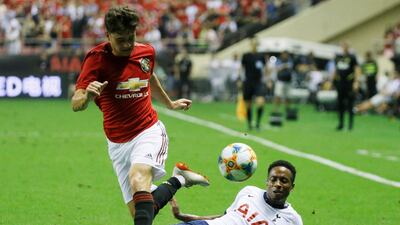 Manchester United's Daniel James in action with Tottenham Hotspur's Kyle Walker-Peters. Reuters