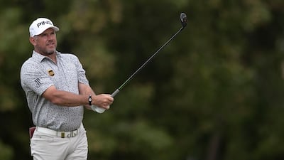 England's Lee Westwood follows his ball on the third fairway. AP Photo
