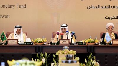 From left: Gulf Cooperation Council secretary general Abdullatif bin Rashid Al Zayani, Kuwaiti finance minister Anas Al Saleh and IMF chief Christine Lagarde during the GCC summit in Kuwait on October 25, 2014. Raed Qutena / EPA