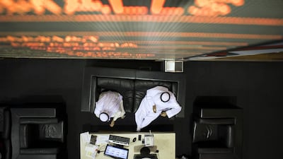 Anxious traders at the floor of Dubai Financial Market. Many Middle Eastern stock markets have taken a turn for the worse in recent months. Reem Mohammed / The National