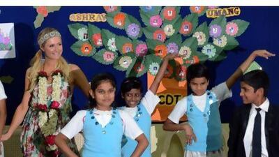 Paris Hilton visited an orphanage in Mumbai on Tuesday after spending the weekend in Goa for India Resort Fashion Week. Indranil Mukherjee / AFP