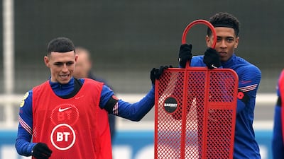 England's Jude Bellingham and Phil Foden, left, at St George's Park. PA