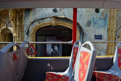 Three buses, right, have been imported from China and pass sites such as Beit Beirut. Courtesy India Stoughton