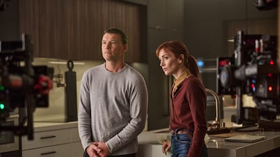 I Will Find You. (L to R) Sam Worthington as David Burroughs and Britt Lower as Rachel Mills behind the scenes of I Will Find You. Photo: Netflix