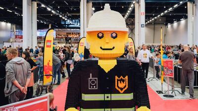 A life-sized Lego figure greets visitors at the Lego building event in Helsinki. AFP
