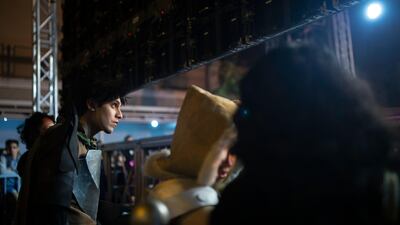 A contestant watches backstage during a costume competition at EgyCon, an annual convention for comics enthusiasts, in Cairo. AP Photo