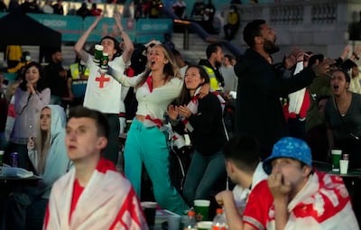 England fans in the fan zone of Trafalgar Square, central London, during the Euro 2020 semi-final between England and Denmark. AP